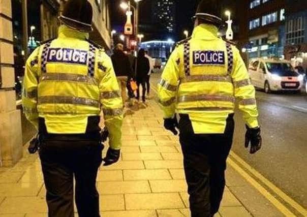 Police officers on patrol as MPs consider new laws to 'protect the protectors' from assault.