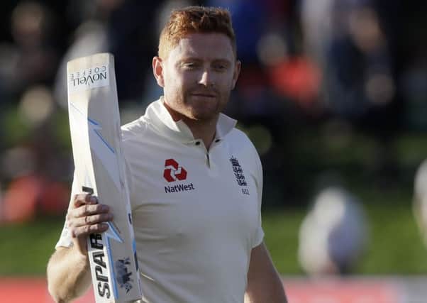 Unbeaten: England's Jonny Bairstow waves his bat to the crowd as he leaves the field on 97 not out.
