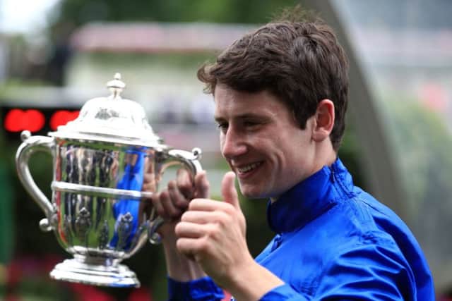 Oisin Murphy celebrates Benbatl's Royal Ascot win.