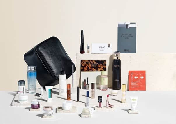HARVEY NICHOLS GIFT WITH PURCHASE: 
Spend Â£195 across three items in the Harvey Nichols Beauty department and receive the SS18 gift with purchase - worth Â£700 - a black vanity case filled with products including Hourglass Veil Mineral Primer, Charlotte Tilbury Magic Eye Cream, Fenty Lipstick and Show Beauty Dry Shampoo. While stocks last.