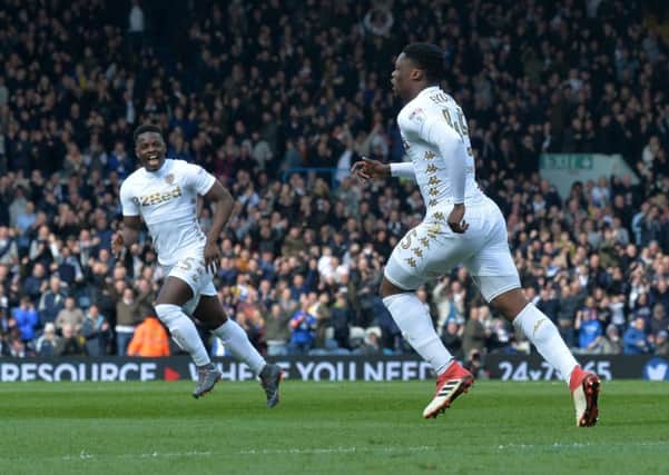 Caleb Ekuban, right, celebrates after scoring his first Championship goal for Leeds United (Picture: Bruce Rollinson).