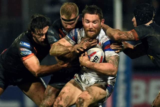 Wakefield's Tyler Randell is halted by Castleford's defence.
 (Picture: Jonathan Gawthorpe)