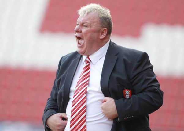 Former Rotherham United manager Steve Evans saw his Peterborough United side grab a stoppage-time equaliser at New York Stadium.