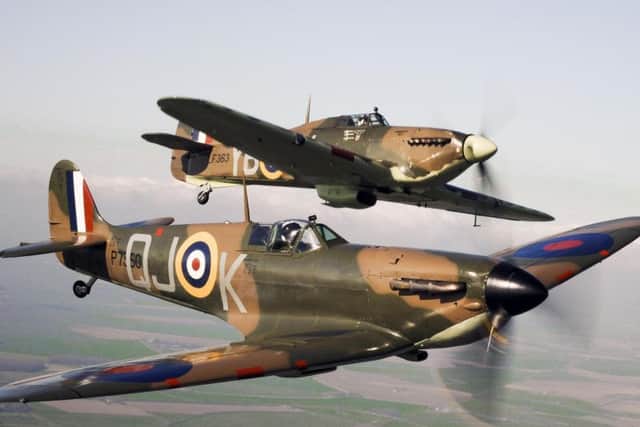 This Ministry of Defence picture from 2010 is of a Spitfire P7350 (front) flying alongside Hurricane LF363 (back) from the Battle of Britain Memorial Flight, over RAF Conningsby. The first Spitfire, with the serial number K5054, flew on March 5, 1936 from Eastleigh Aerodrome with Yorkshire test pilot 'Mutt' Summers at the controls. Picture: SAC Neil Chapman/MoD/Crown Copyright/PA Wire