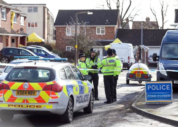 Police in the Salisbury cul-de-sac where it is believed Russian spy Sergei Skripal and his daughter were poisoned.