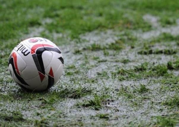 How has Easter Monday's snow and rain hit the football and rugby league schedules?