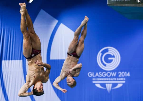 In sync: Jack Laugher, right, and his 3m synchro partner Chris Mears in action at the 2014 Commonwealth Games, where they would win gold, two years before replicating the feat at the Rio Olympics. (Picture: Alex Whitehead/SWPix.com)