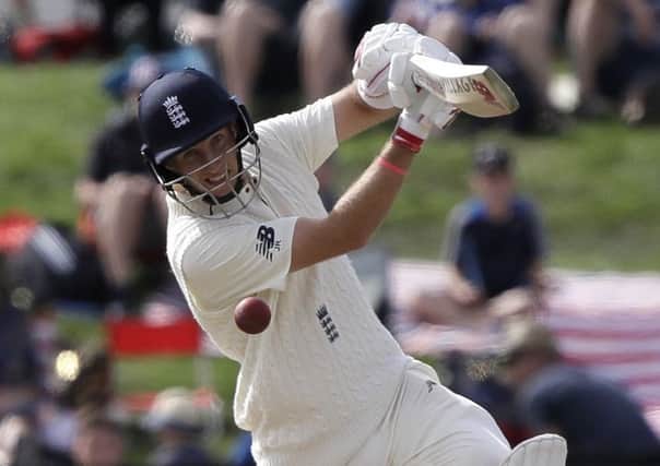 England's Joe Root bats during play on day four of the second cricket test against New Zealand at Hagley Oval in Christchurch, New Zealand. (AP Photo/Mark Baker)