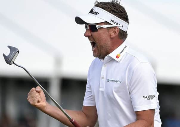Ian Poulter reacts after his par putt to win the Houston Open golf tournament in a one-hole playoff on the 18th hole over Beau Hossler, Sunday, April 1 (AP Photo/Eric Christian Smith)