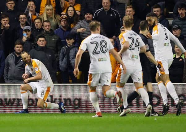 Hull City's David Meyler (left) celebrates scoring his side's first goal from the penalty spot. Picture: Nigel French/PA.