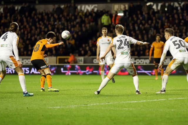 LATE BLOW: Wolves' Oskar Buur (second left) scores his side's 83rd-minute equaliser . Picture: Nigel French/PA