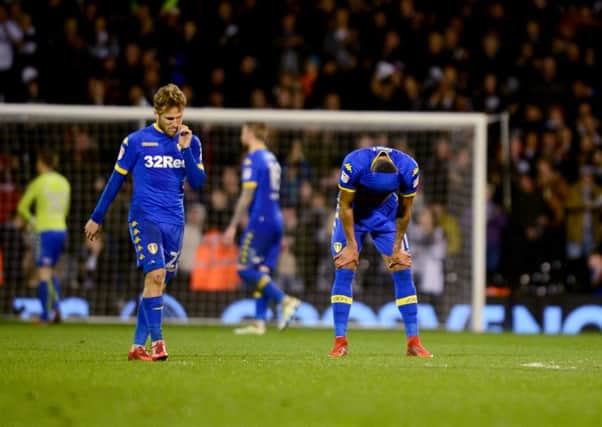 Samuel Saiz, of Leeds United and Jay-Roy Grot, of Leeds United, dejected after their team lost 2-0 against Fulham FC v Leeds United at Craven Cottage, London, in the Sky BET Championship 3rd April 2018. Picture James Hardisty.