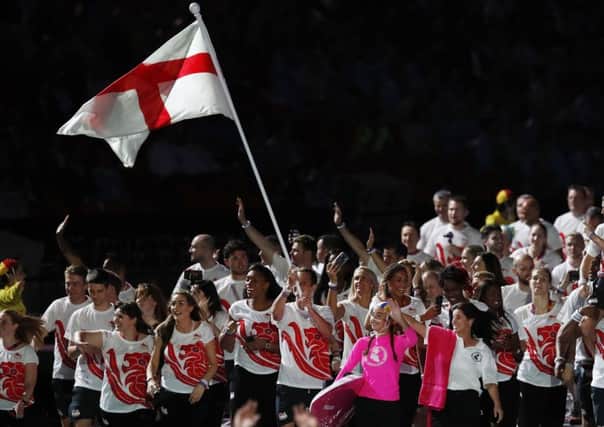 Alistair Brownlee leads the England team out during the Games opening ceremony this week. (PA).