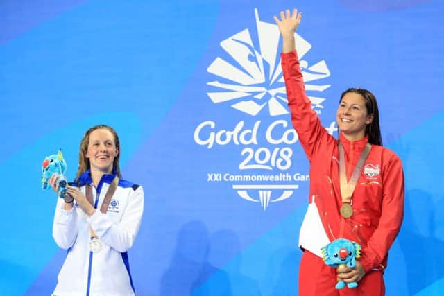 England's Aimee Willmott (right) with her gold medal and Scotland's Hannah Miley (silver) who won silver in the Women's 400m Individual Medley at the Optus Aquatic Centre. Picture: Danny Lawson/PA