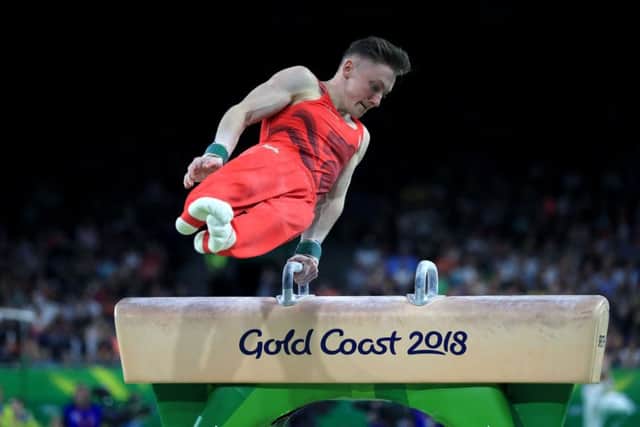 England's Nile Wilson competes on the Pommel horse in the men's gymnastics team event final at the Coomera Indoor Sports Centre. Picture: Mike Egerton/PA.