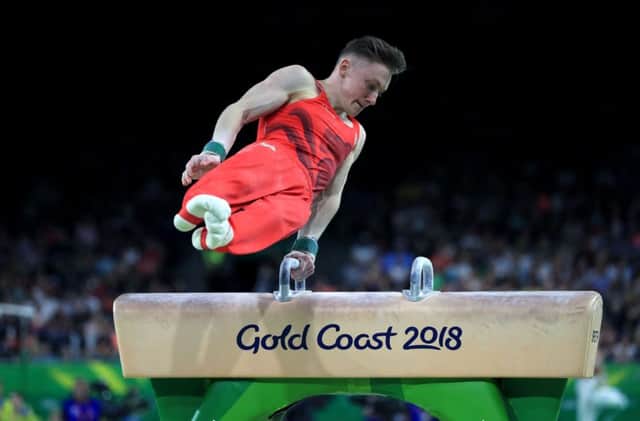 England's Nile Wilson competes on the Pommel horse in the men's gymnastics team event final at the Coomera Indoor Sports Centre. Picture: Mike Egerton/PA.