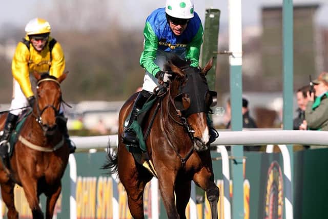 Comply Or Die and Timmy Murphy win the 2008 Grand National for David Pipe.