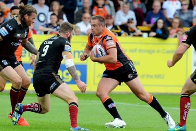 Top career: Tigers Andy Lynch takes the ball forward in his 500th game . Picture: Matthew Merrick