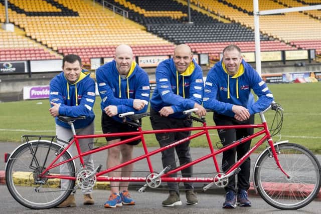 Wembley-bound: Robbie Hunter-Paul, Keith Senior, Chev Walker and Andy Lynch with one of the tandems to be used in the RL Cares Ride to Wembley. Picture: Allan McKenzie/SWpix