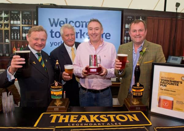 From left: Simon Theakston, Brian Turner, Simon Parker and Sir Gary Verity at last year's Great Yorkshire Show where Mr Parker's pub, The White Swan in Ampleforth, was named Yorkshire's Favourite Pub. Picture by Richard Walker/www.imagenorth.net