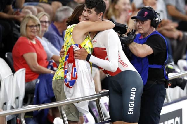 England's Charlie Tanfield (right) celebrates winning gold in the Men's 4000m Individual Pursuit Finals (Picture: Martin Rickett/PA Wire)