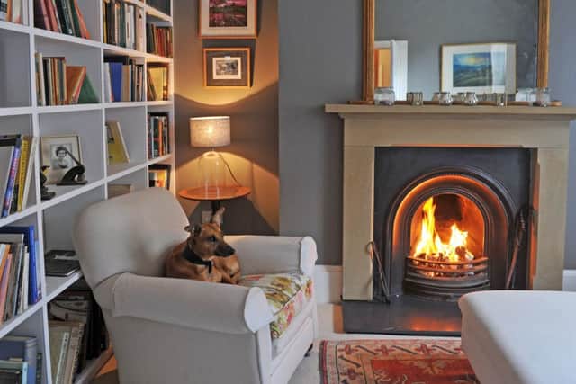 The sitting room is telly-free zone and is made for reading and relaxing. The family whippet is happy here