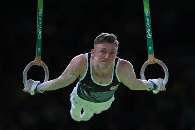 England's Nile Wilson on the Still Rings on his way to winning a gold medal in the Men's Individual All-Round Final. Picture: Mike Egerton/PA