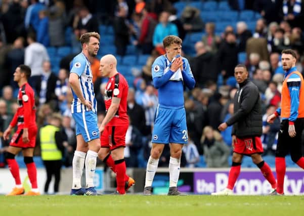 Brighton & Hove Albion's Dale Stephens (left) and Solly March react after the Premier League match at the AMEX Stadium, Brighton.