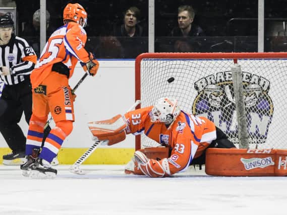Marh Matheson (25) watches on as the puck slides past goalie Ervins Mustukovs after just 47 seconds to give Nottingham the lead. Picture courtesy of EIHL.