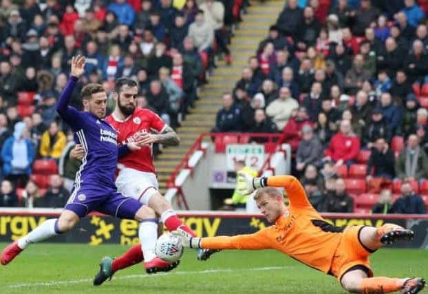 Adam Davies of Barnsley saves at the feet of Billy Sharp of Sheffield United. (Picture: Simon Bellis/Sportimage)