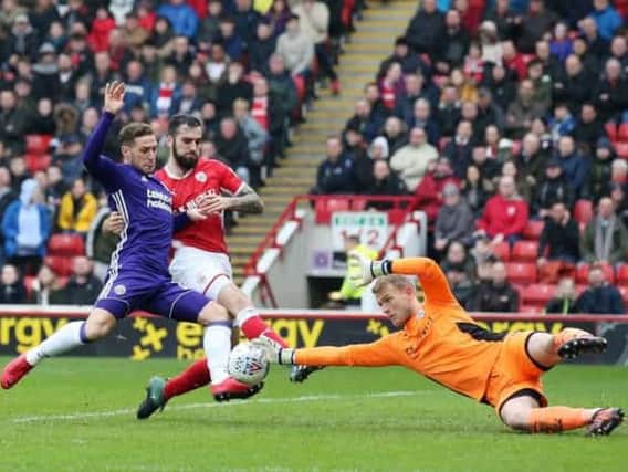 Adam Davies of Barnsley saves at the feet of Billy Sharp of Sheffield United. (Picture: Simon Bellis/Sportimage)