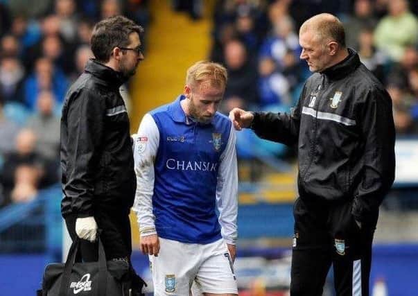 Out: Barry Bannan comes off in the first half of Sheffield Wednesday's match against Fulham. Picture: Steve Ellis