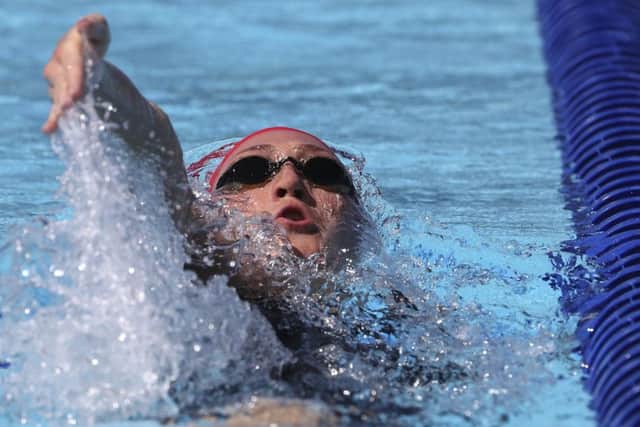 England's Elizabeth Simmonds competes in her women's 200m backstroke heat at the Aquatic Centre during the 2018 Commonwealth Games. (AP Photo/Rick Rycroft)