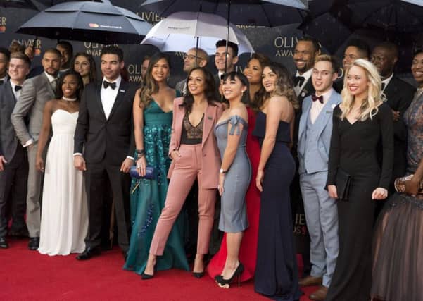 The cast of the musical Hamilton arriving for The Olivier Awards at the Royal Albert Hall in London.
