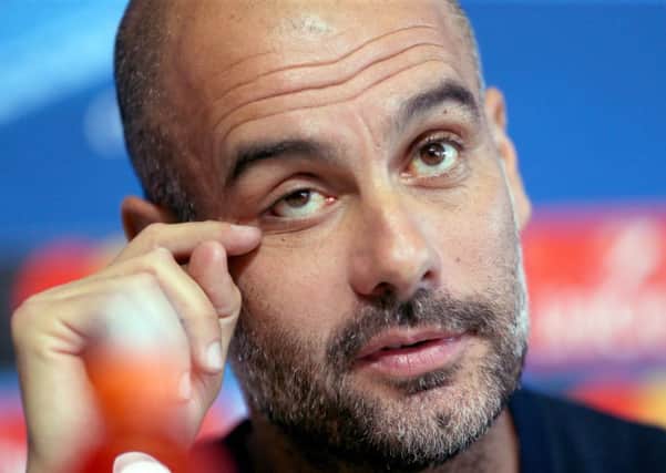 Manchester City manager Pep Guardiola: Faces huge task.