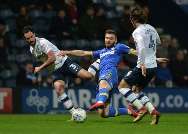 Stuart Dallas stretches for the ball past Greg Cunningham and Ben Pearson. Picture: Bruce Rollinson