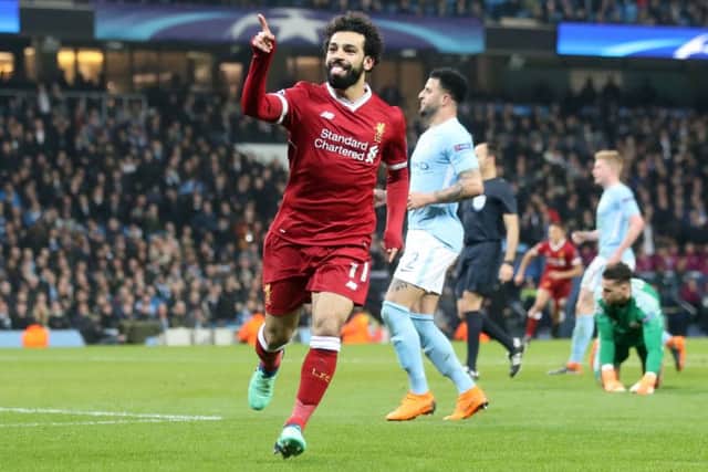 Liverpool's Mohamed Salah celebrates scoring his side's first goal of the game at the Etihad Stadium. Picture: Nick Potts/PA Wire