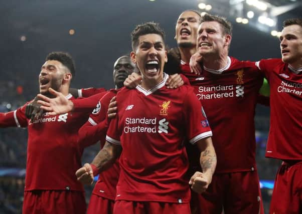 Liverpool's Roberto Firmino celebrates scoring his side's second goal at the Etihad Stadium. Picture: Nick Potts/PA Wire