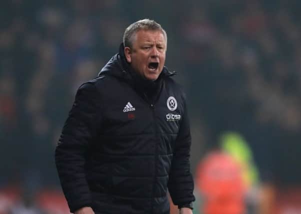 DELIGHTED: Chris Wilder on the touchline during Tuesday night's clash with Middlesbrough at Bramall Lane. Bellis/Sportimage