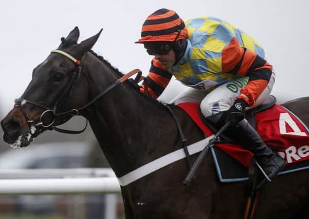 Nicky Henderson's Might Bite chases Grade One honours at Aintree on day one of the Randox Health Grand National meeting.