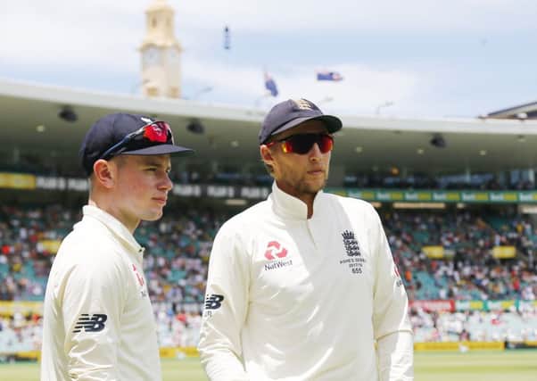 LEADERSHIP: England and Yorkshire's Joe Root, right, talks with Mason Crane during day two of the Ashes Test at Sydney. Picture: Jason O'Brien/PA