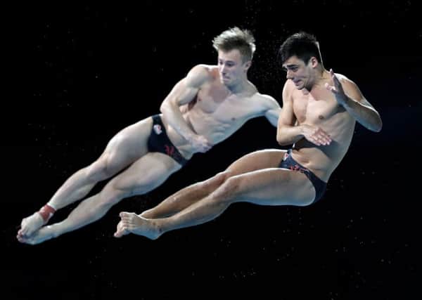 Jack Laugher and Chris Mears win Commonwealth gold in the diving.