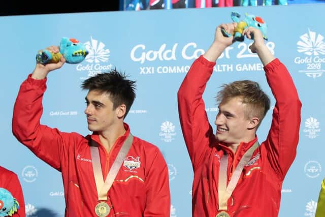England's England's Jack Laugher (left) and Chris Mears celebrate winning gold. Picture: Danny Lawson/PA