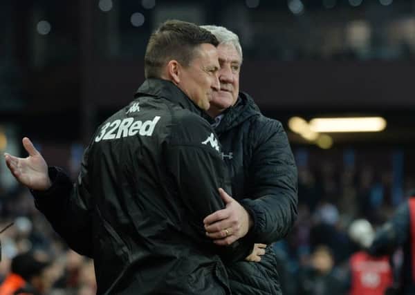 HOW YOU DOING? Leeds boss Paul Heckingbottom is greeted by Aston Villa's Steve Bruce at Villa Park. Picture: Bruce Rollinson