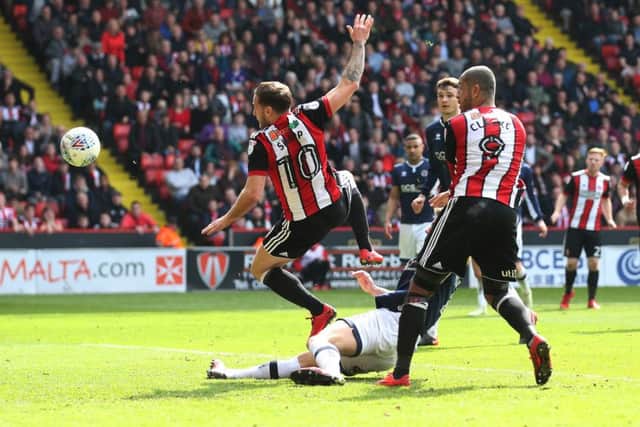 Sheffield United's Billy Sharp sidefoots towards goal during Saturday's clash against Millwall at Bramall Lane. Picture: Simon Bellis/Sportimage