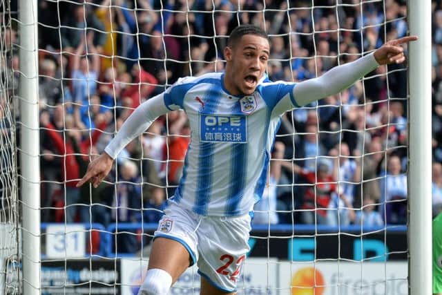 Hero: Tom Ince celebrate's his match-winning goal. Picture: Bruce Rollinson