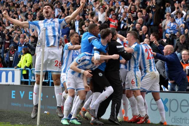 YOU BEAUTY: Huddersfield Town and Tom Ince celebrate his match-winning goal against Watford.  Picture: Bruce Rollinson