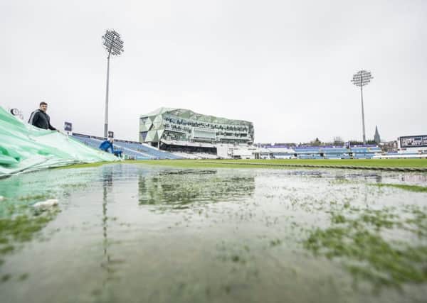 Water pours off the covers at Headingley on day one of Yorkshires County Championship match with Essex (Picture: Allan McKenzie/SWpix.com).