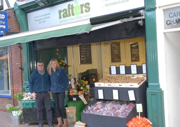 Andy and Tracy Rafter outside their shop on Middle Street South, Driffield