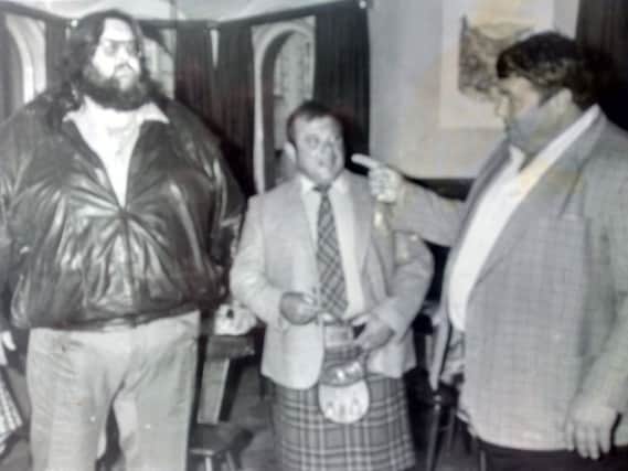 Mick McMichael, centre, with Giant Haystacks (left).